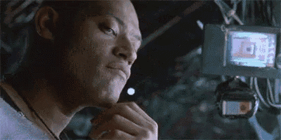 Animated reaction meme of Morpheus saying 'Show me'
